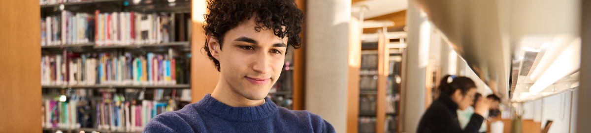 Male student in library