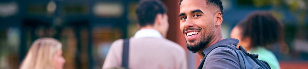 Smiling male college student