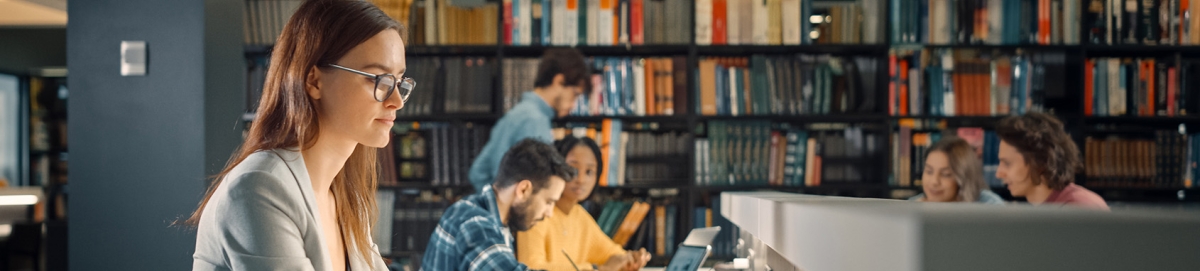 Female college student at the library.