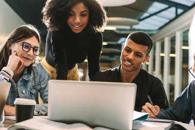 Photo of group of college students studying together