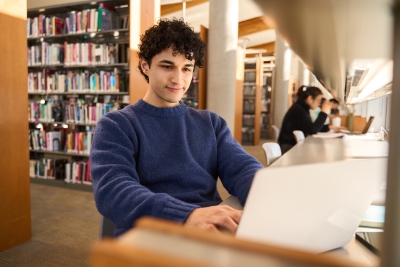 Male student in library